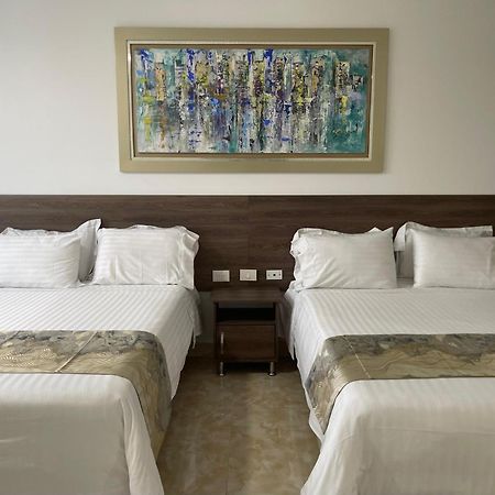 Hotel Royal Elim International 칼리 외부 사진 A room at the hotel