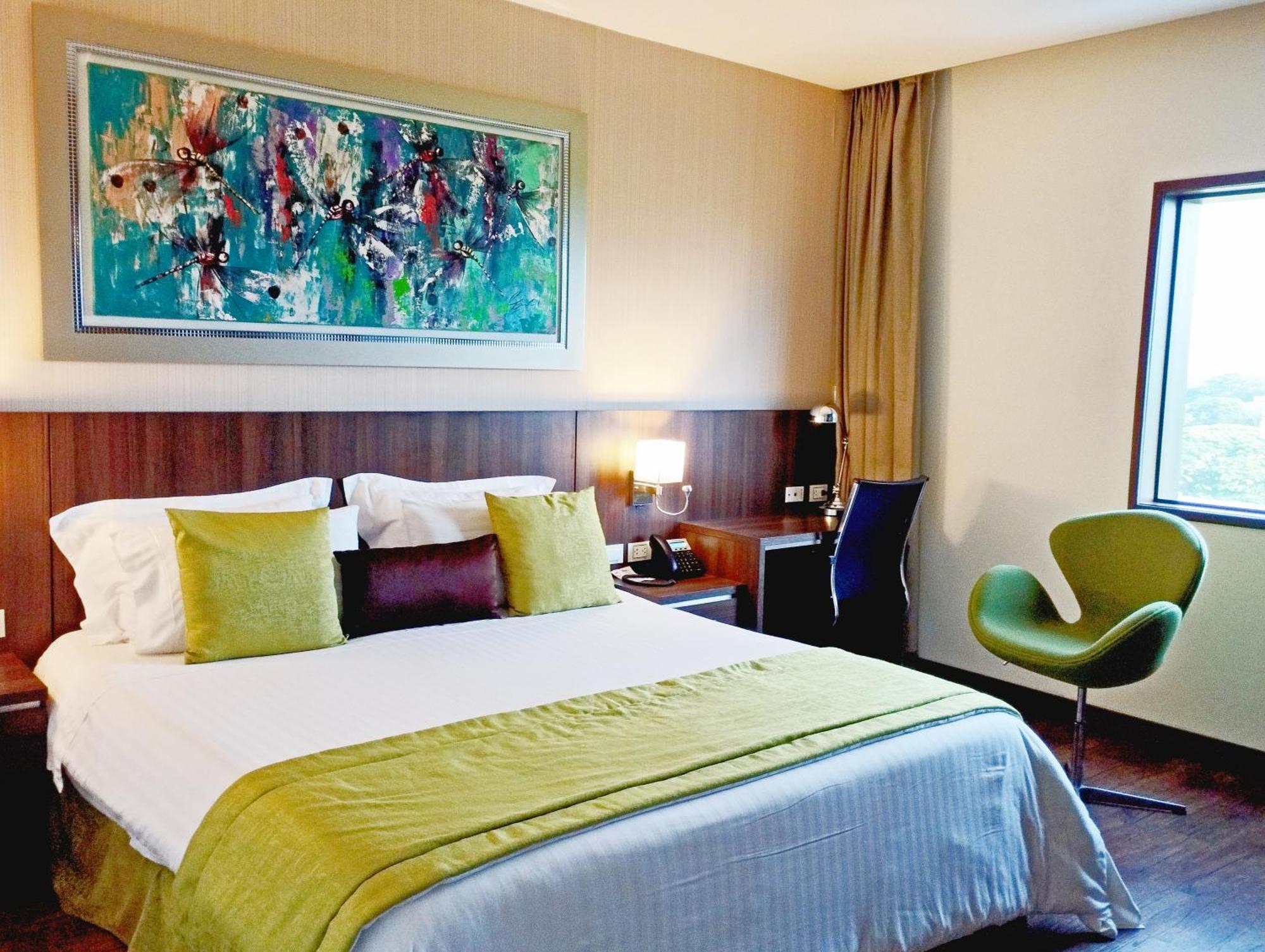 Hotel Royal Elim International 칼리 외부 사진 A room at the hotel